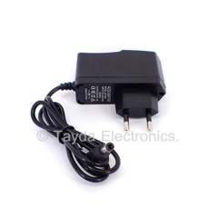 SP-888 AC 100V-240V to DC 9V 1A Power Supply Converter Adapter 